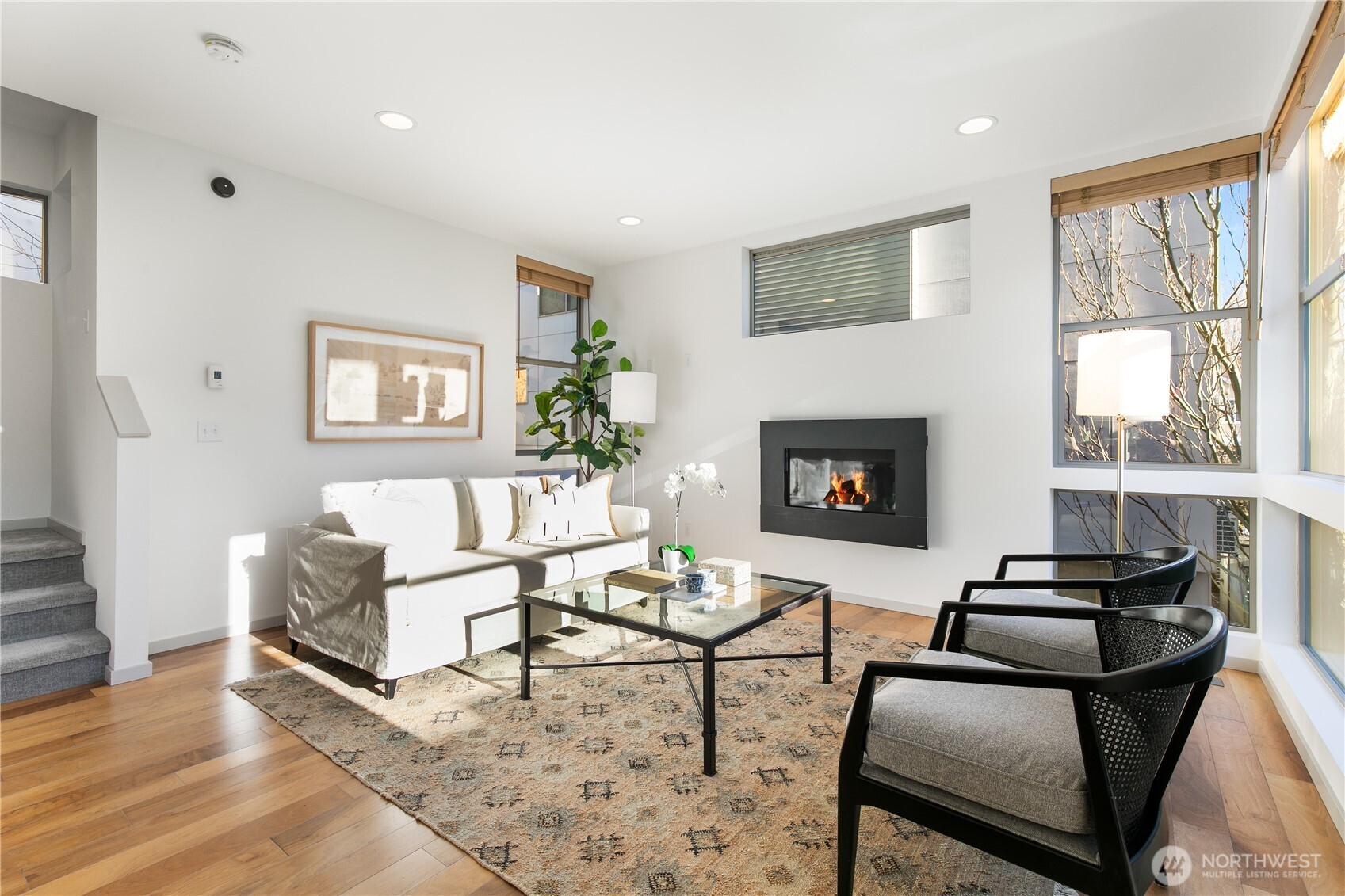 6729 14th Avenue Northwest, Unit B Seattle, WA 98117 - Photo 5 of 36 a living room with furniture fireplace and window