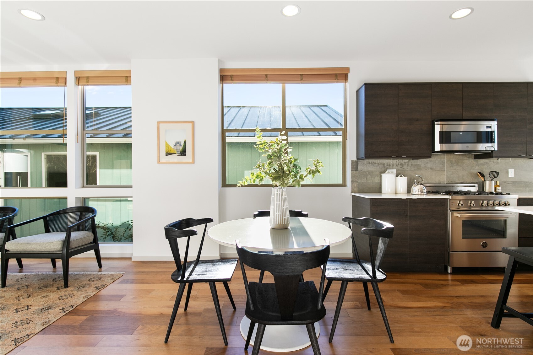 6729 14th Avenue Northwest, Unit B Seattle, WA 98117 - Photo 6 of 36 a view of a dining room with furniture window and outside view
