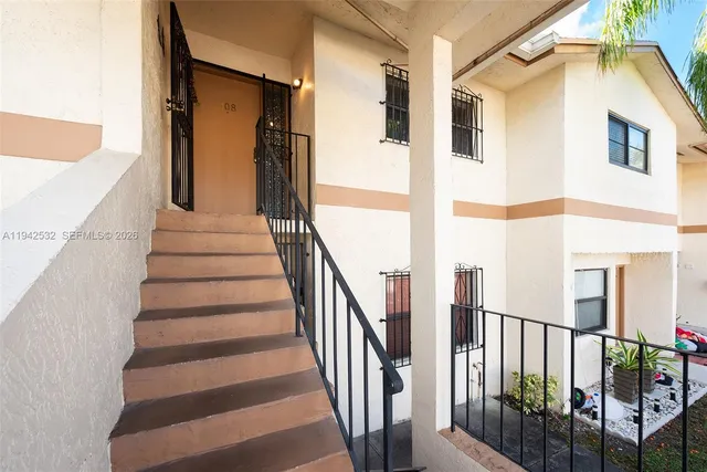 a view of entryway with a front door