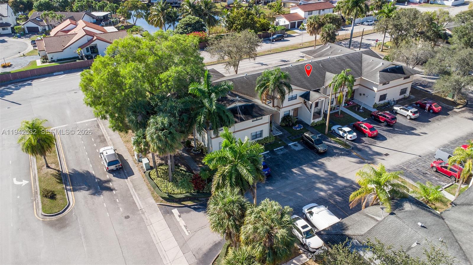 12960 Southwest 66th Lane, Unit 1081 Miami, FL 33183 - Photo 19 of 20 an outdoor space with seating area