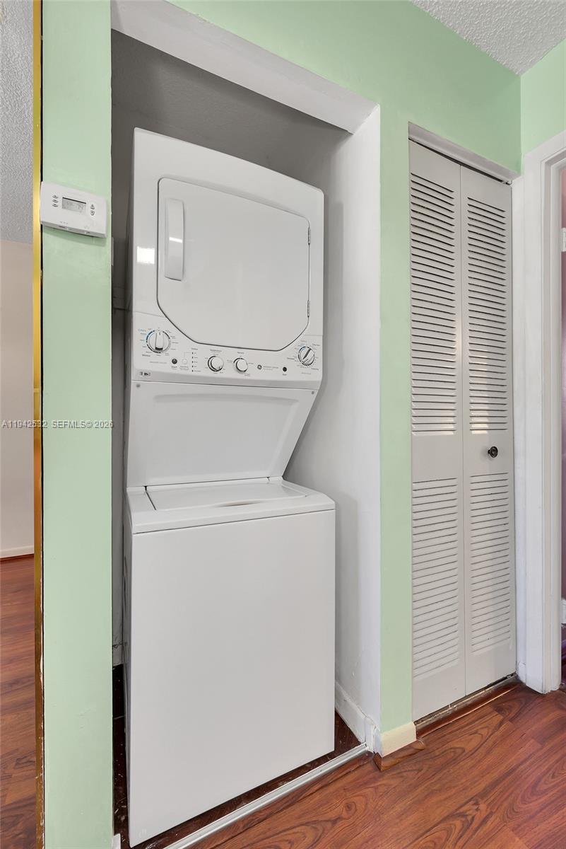 12960 Southwest 66th Lane, Unit 1081 Miami, FL 33183 - Photo 9 of 20 a utility room with dryer and washer
