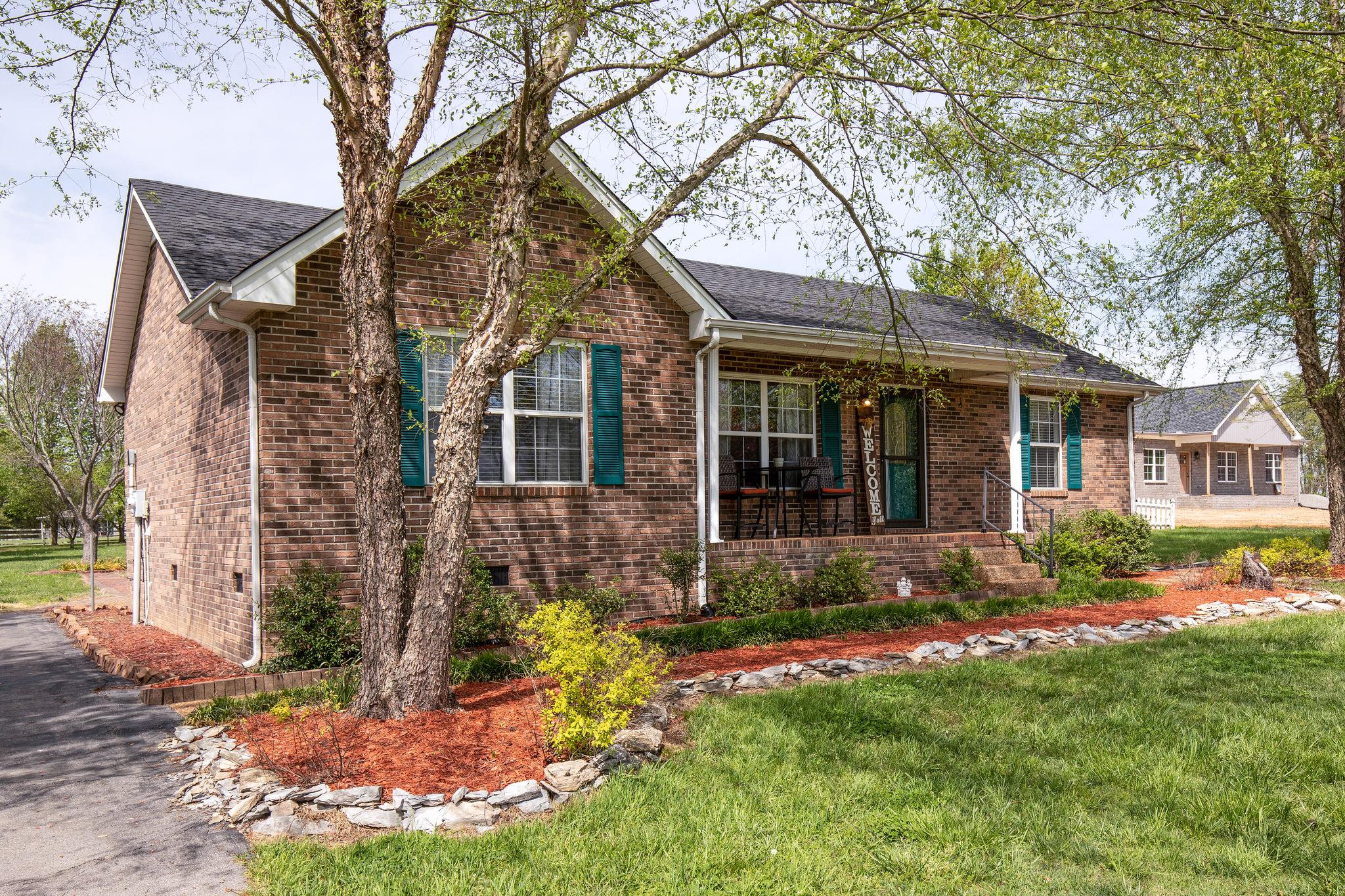 349 Lear Road Portland, TN 37148 - Photo 2 of 24 front view of a house with a yard