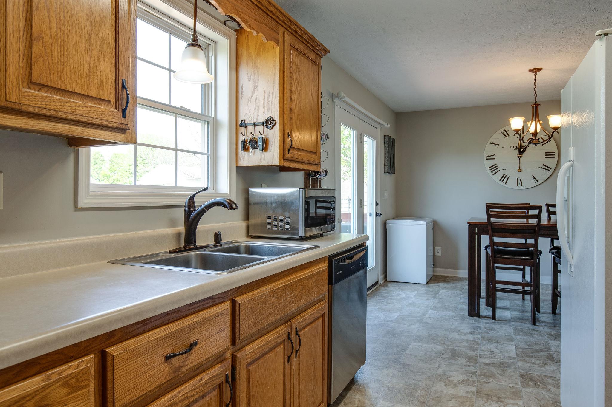 349 Lear Road Portland, TN 37148 - Photo 11 of 24 a kitchen with a sink cabinets and window