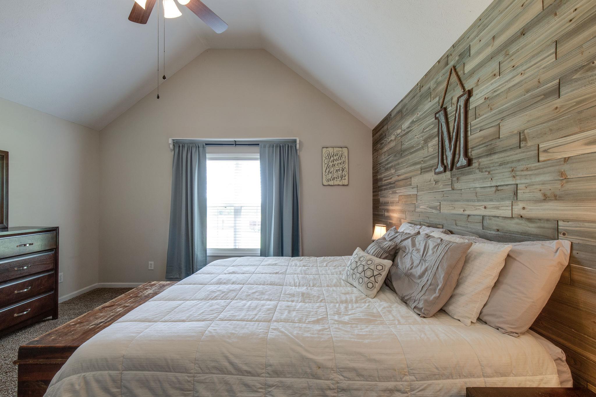 349 Lear Road Portland, TN 37148 - Photo 13 of 24 a bedroom with a bed and a window