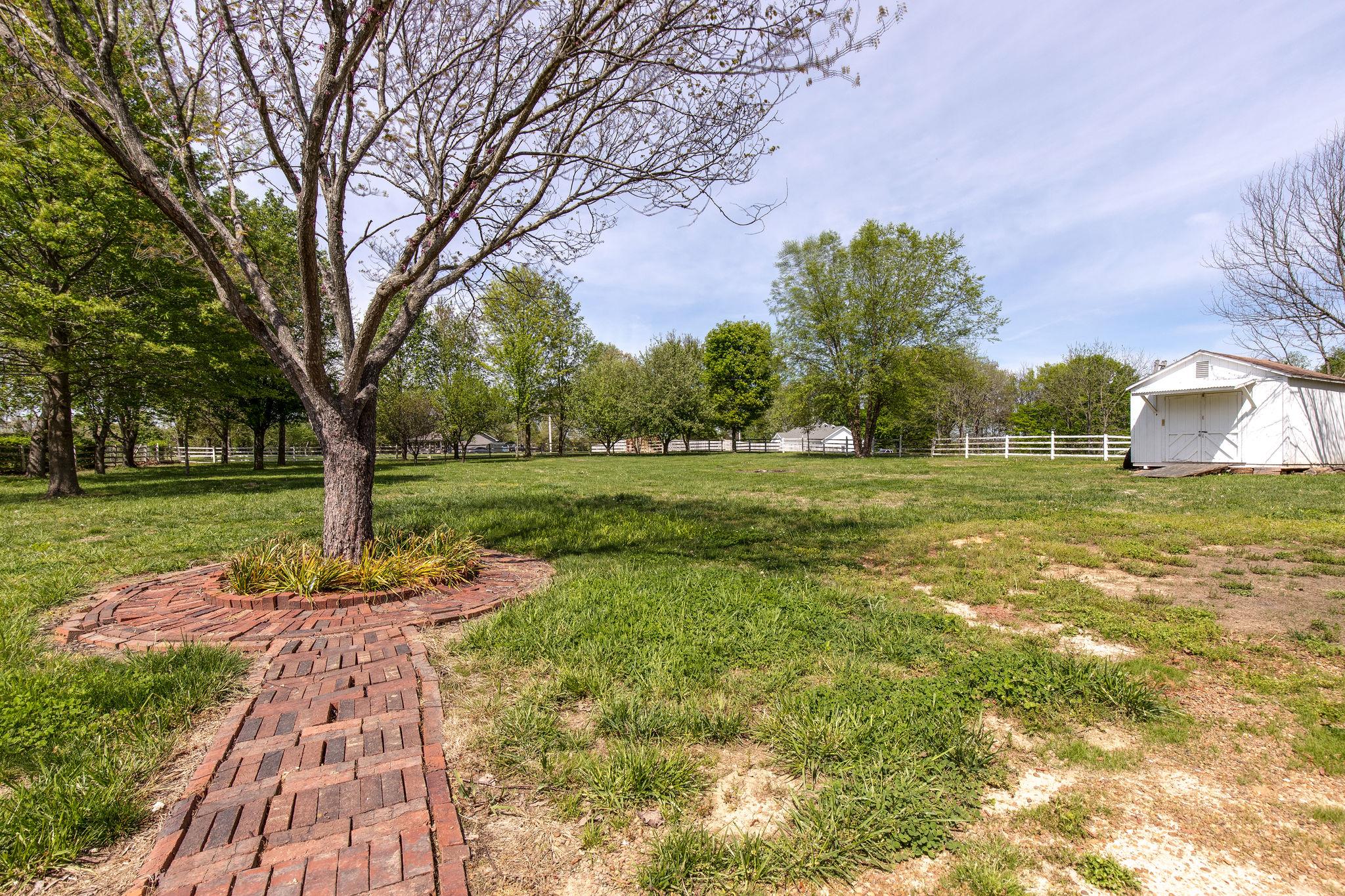 349 Lear Road Portland, TN 37148 - Photo 22 of 24 a view of a patio with a yard