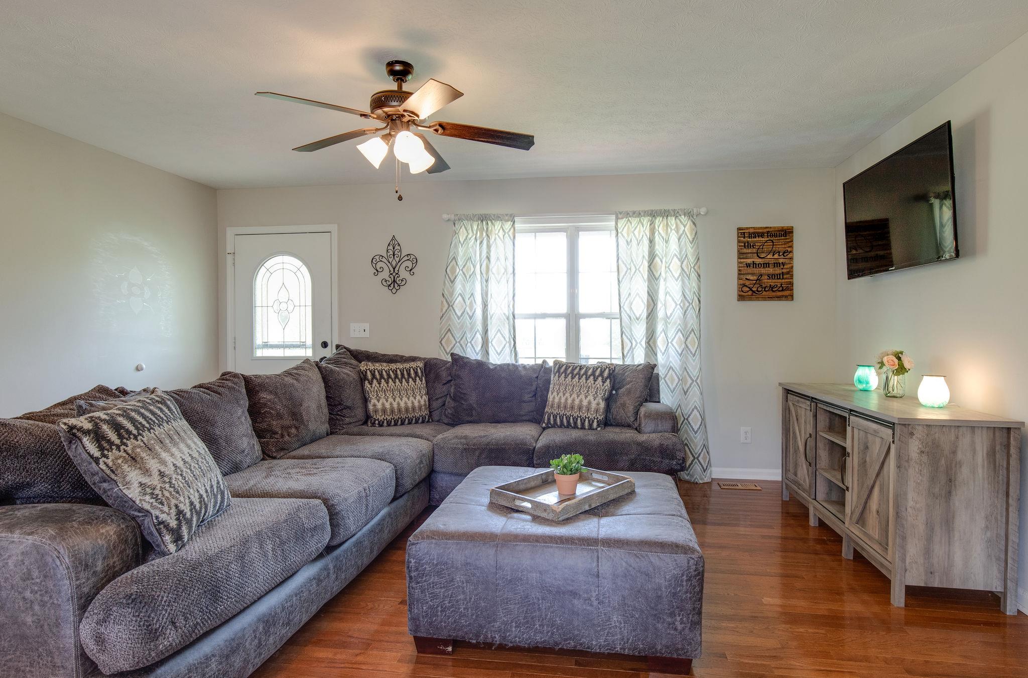 349 Lear Road Portland, TN 37148 - Photo 5 of 24 a living room with furniture and a flat screen tv