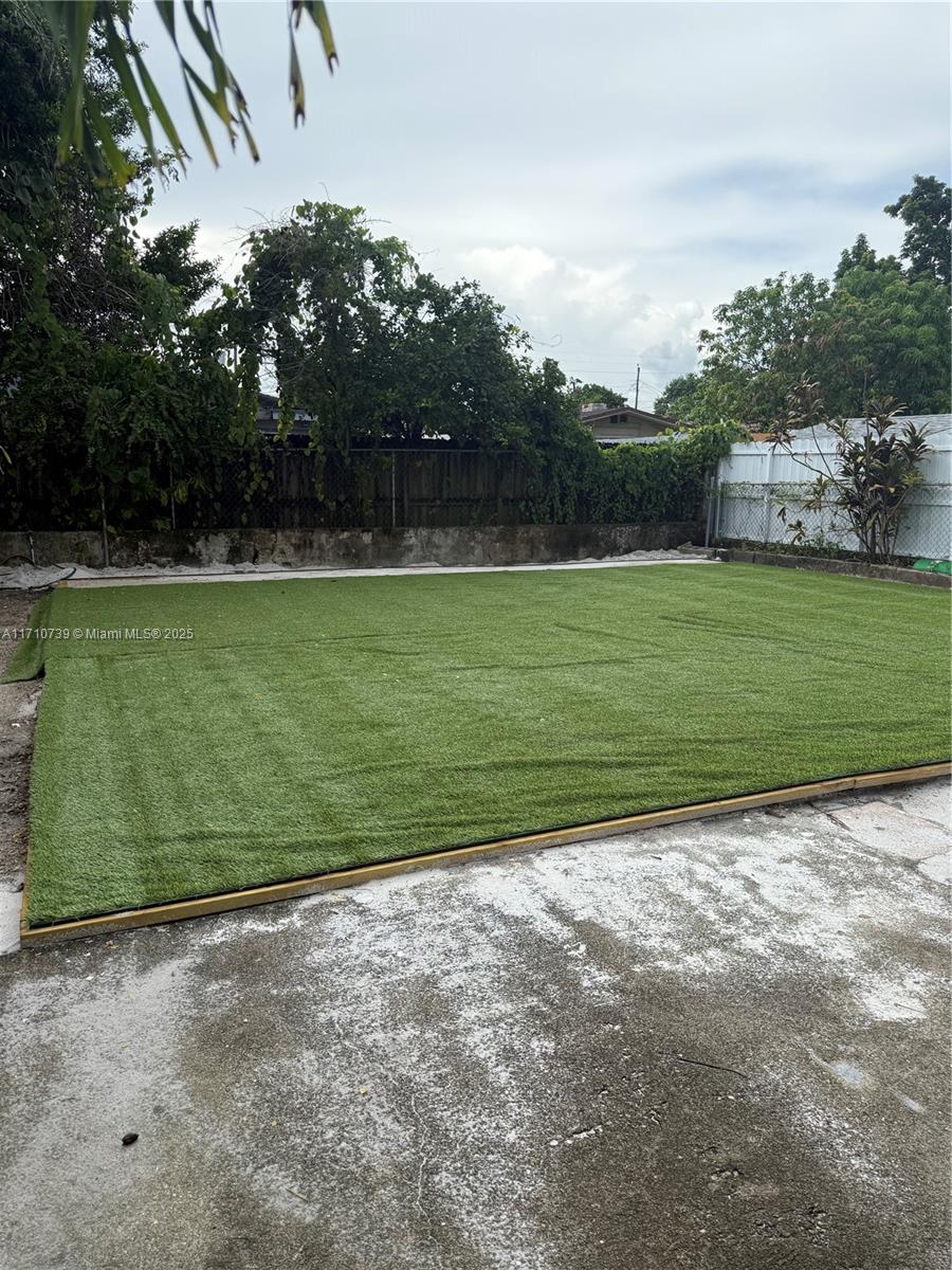 2230 Southwest 60th Court Miami, FL 33155 - Photo 61 of 64 a view of a field with an trees