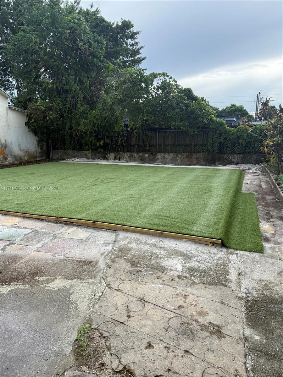 2230 Southwest 60th Court Miami, FL 33155 - Photo 62 of 64 a view of a yard with a large trees