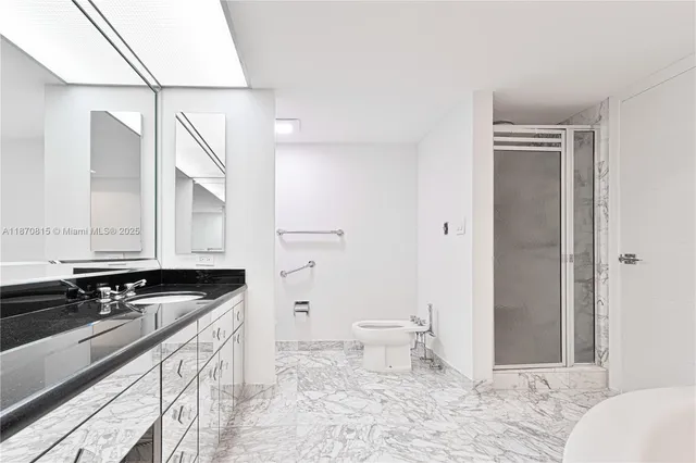 a bathroom with a bathtub and a sink