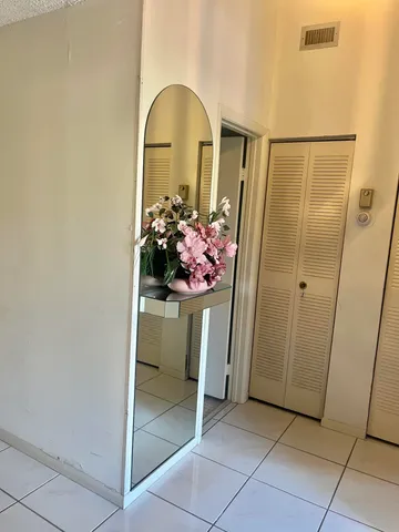 a view of a swimming pool from a balcony