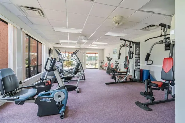 a view of a swimming pool with an outdoor space and seating area