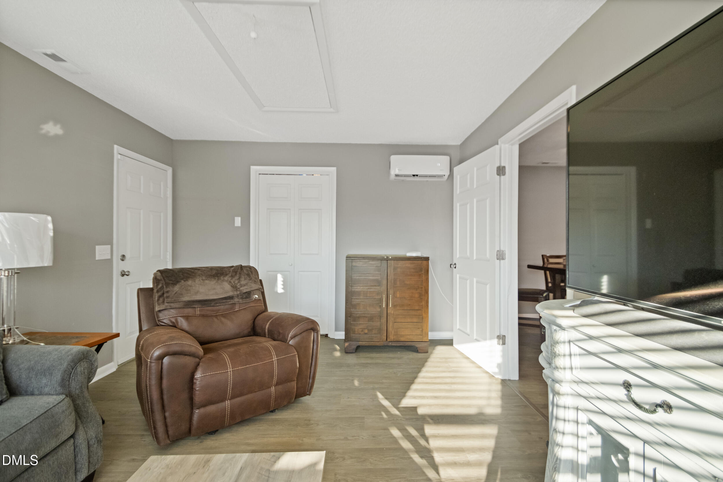 5909 Spinner Road Hope Mills, NC 28348 - Photo 10 of 24 a bedroom with furniture and a couch