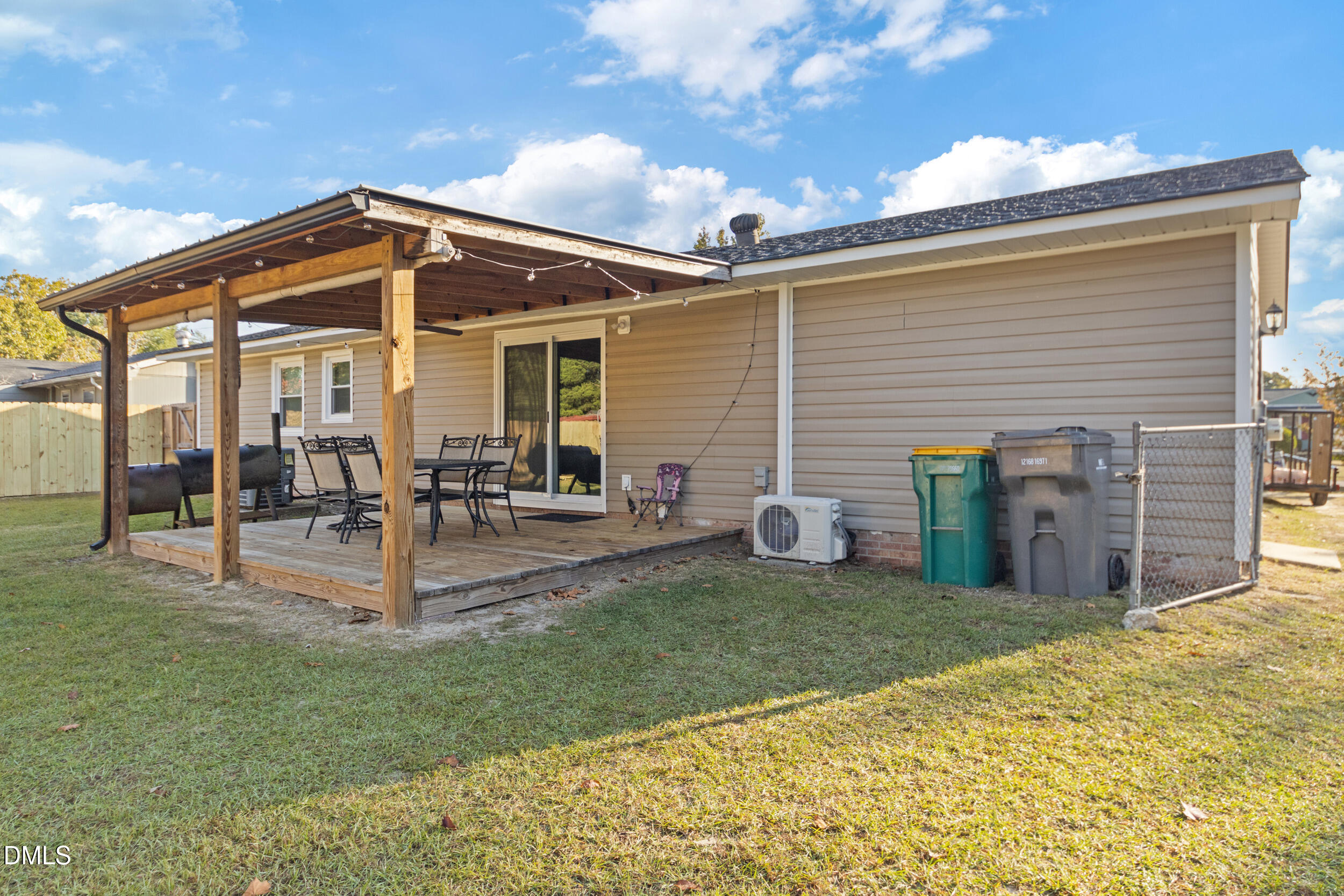 5909 Spinner Road Hope Mills, NC 28348 - Photo 21 of 24 a view of a house with patio