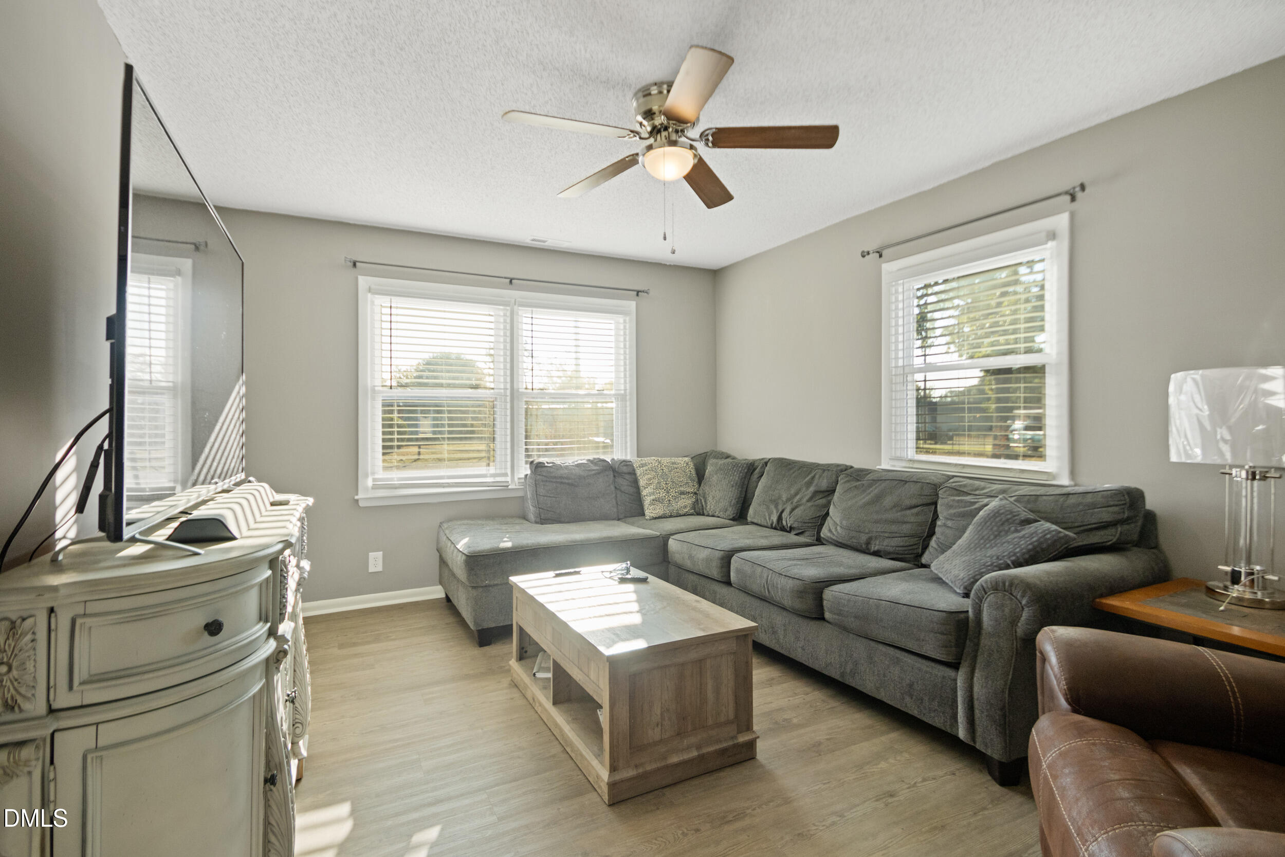 5909 Spinner Road Hope Mills, NC 28348 - Photo 8 of 24 a living room with furniture and a window