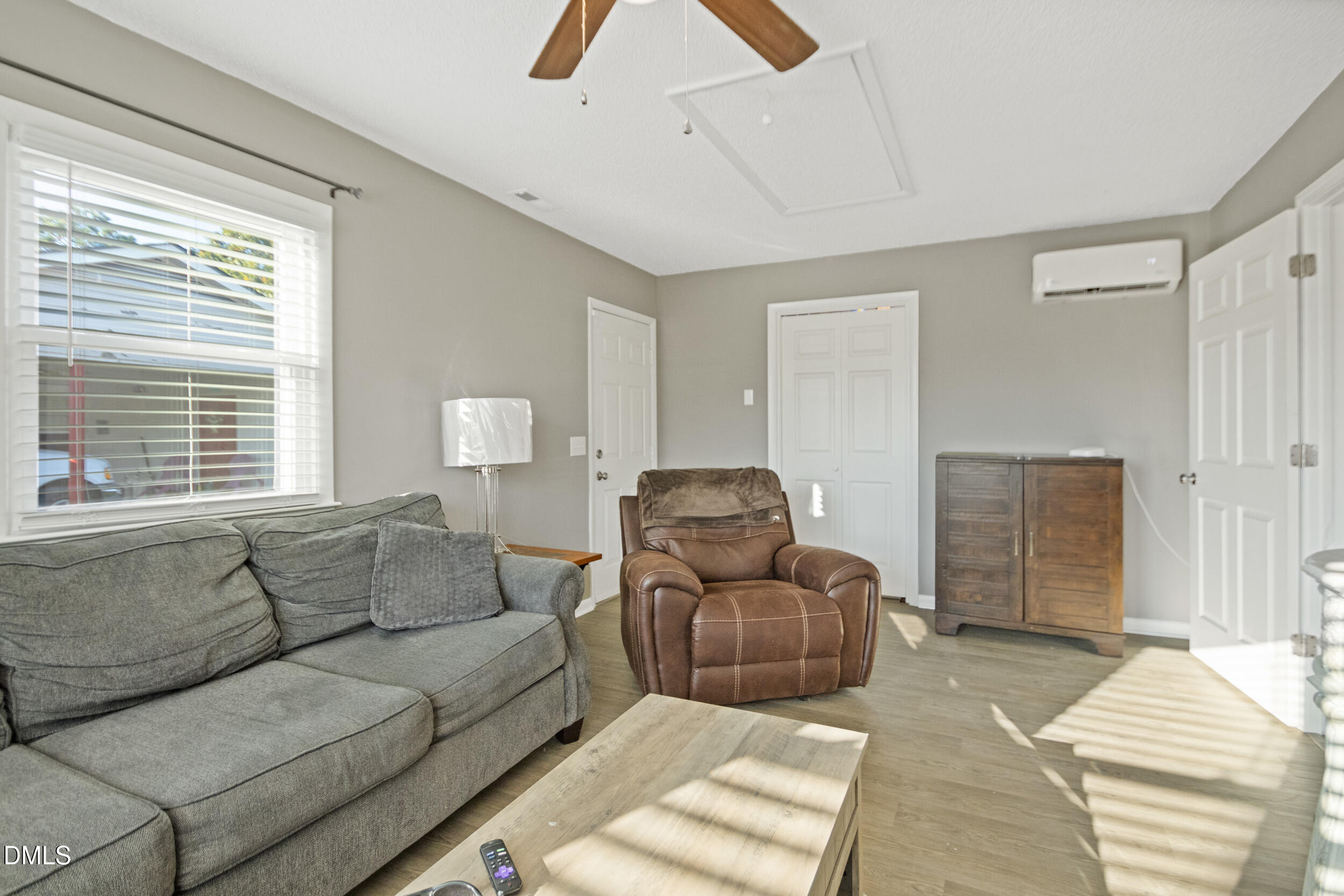 5909 Spinner Road Hope Mills, NC 28348 - Photo 9 of 24 a living room with furniture and a window