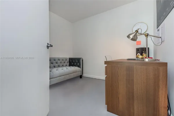 a bathroom with a bathtub and a sink