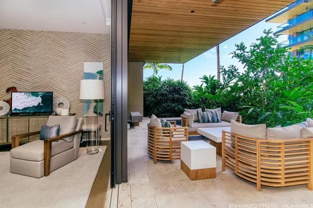 a outdoor living space with patio furniture and a potted plant