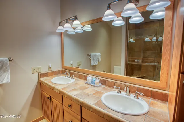 a bedroom with double bed and a window