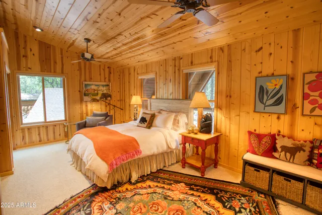 a view of a chairs and table in the balcony