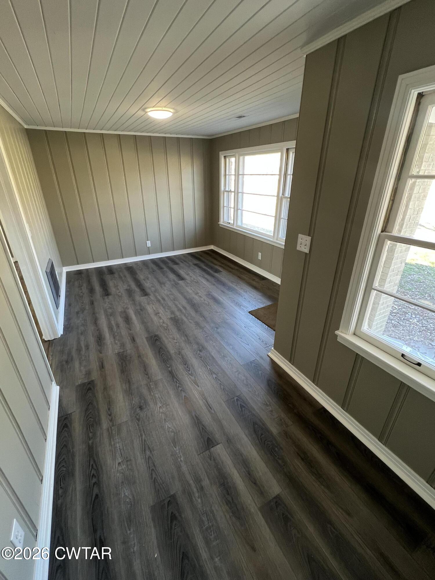 2094 Old Stage Road Adamsville, TN 38310 - Photo 5 of 12 a view of an empty room and window