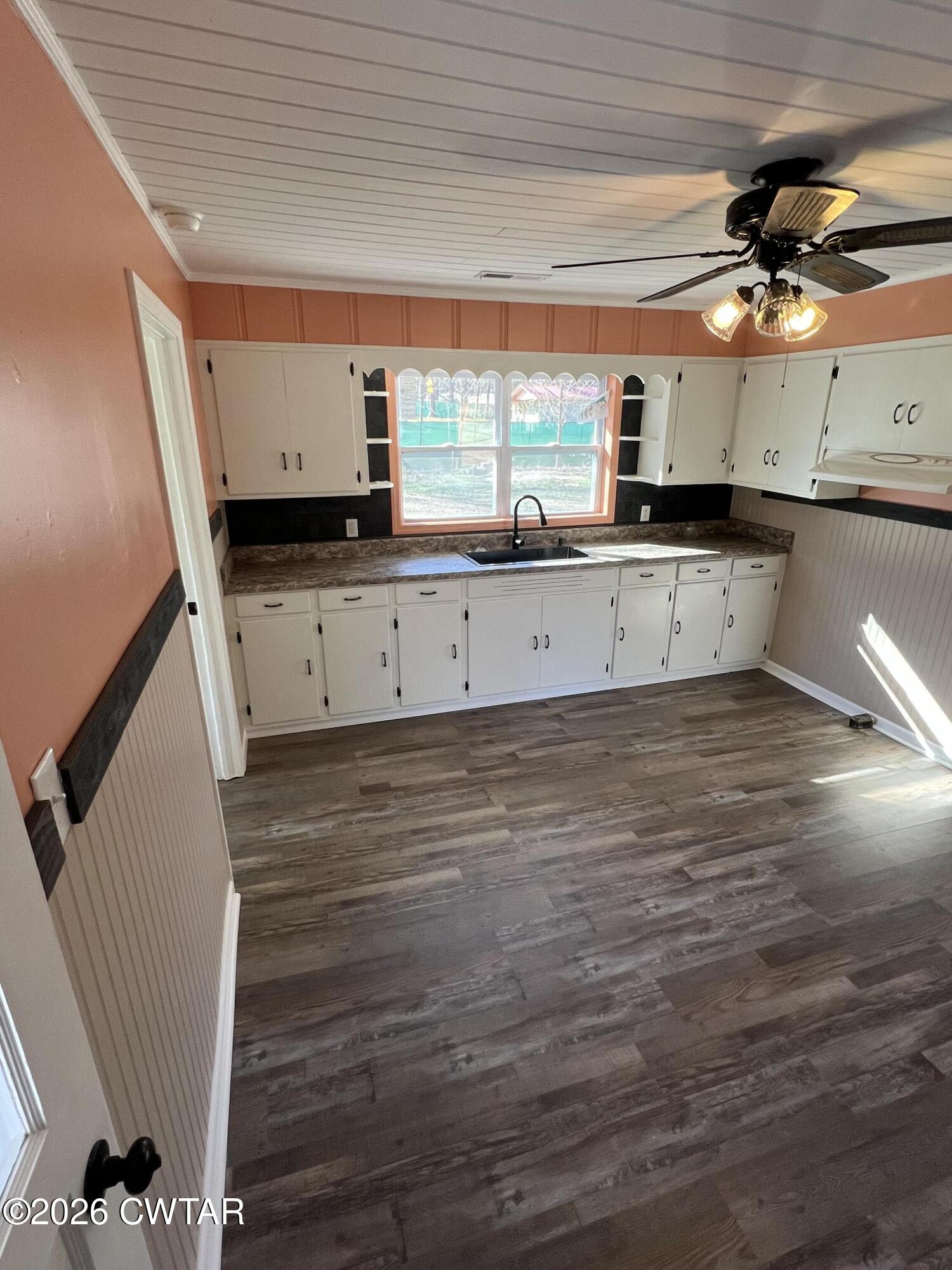2094 Old Stage Road Adamsville, TN 38310 - Photo 8 of 12 a view of a kitchen with a window