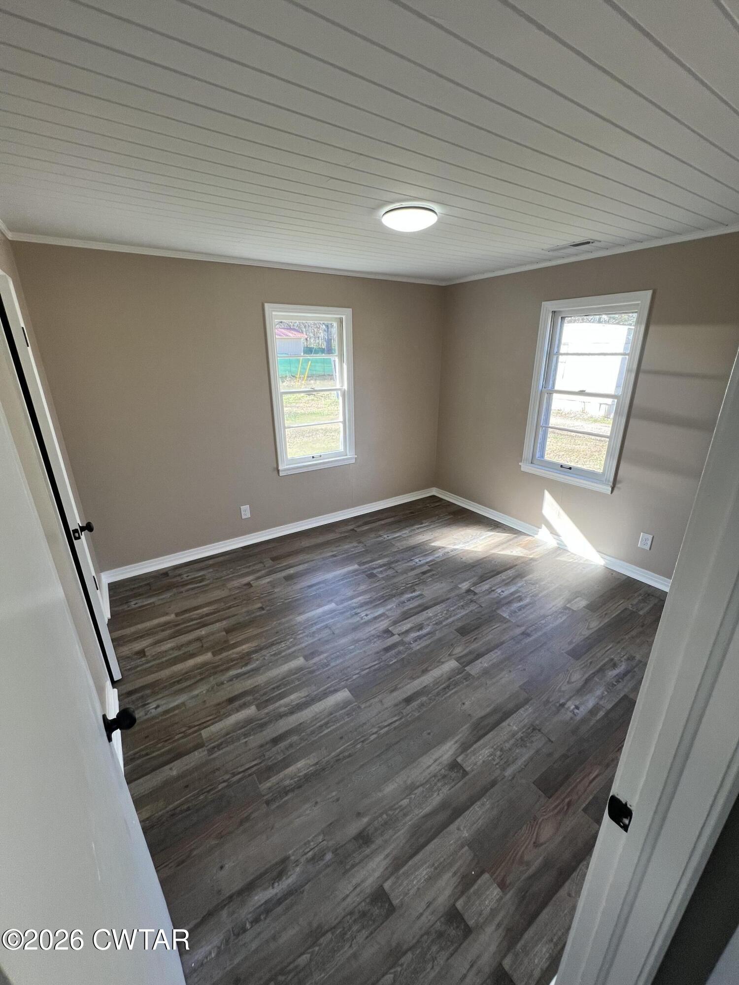 2094 Old Stage Road Adamsville, TN 38310 - Photo 10 of 12 a view of an empty room and window