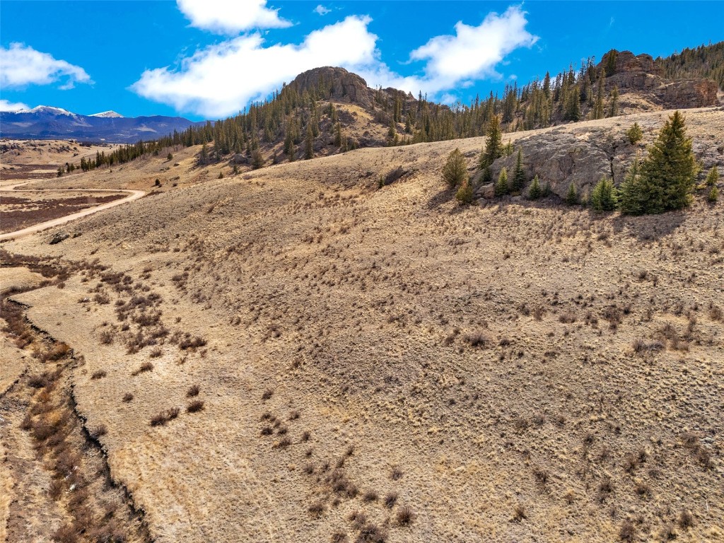 a view of a road with a mountain