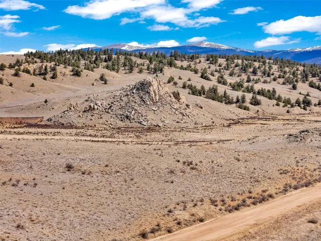 a view of a yard covered in snow