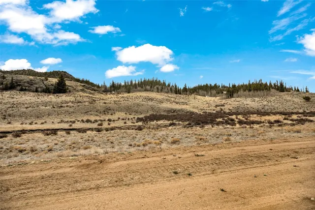a view of a covered with snow in the background