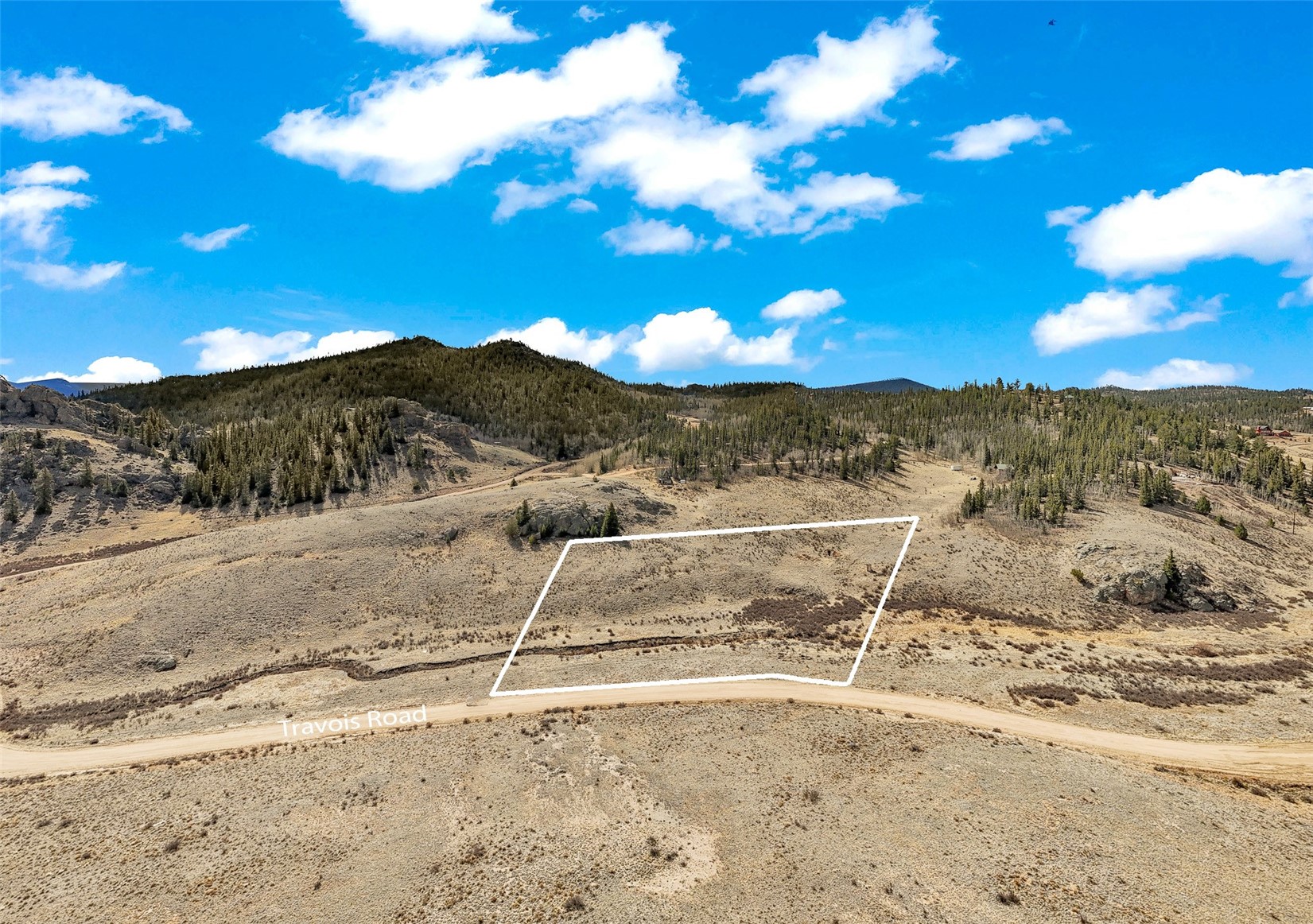1950 Travois Road Como, CO 80456 - Photo 34 of 35 a view of a yard with wooden fence