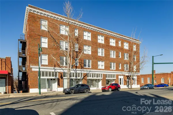 a front view of a building with street view