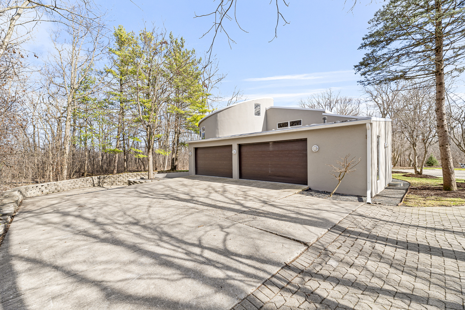 4 Dunsinane Lane Bannockburn, IL 60015 - Photo 33 of 40 a view of the house with a yard and trees