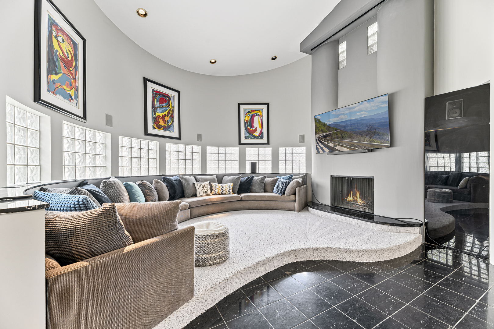 4 Dunsinane Lane Bannockburn, IL 60015 - Photo 8 of 40 a living room with furniture a fireplace and a flat screen tv