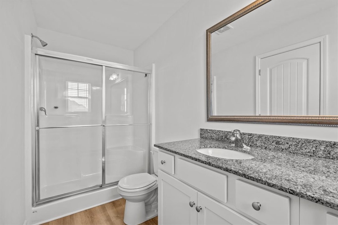 118 Adger Road Pendleton, SC 29670 - Photo 21 of 31 This bathroom offers a functional layout with a shower and vanity, ideal for daily routines.