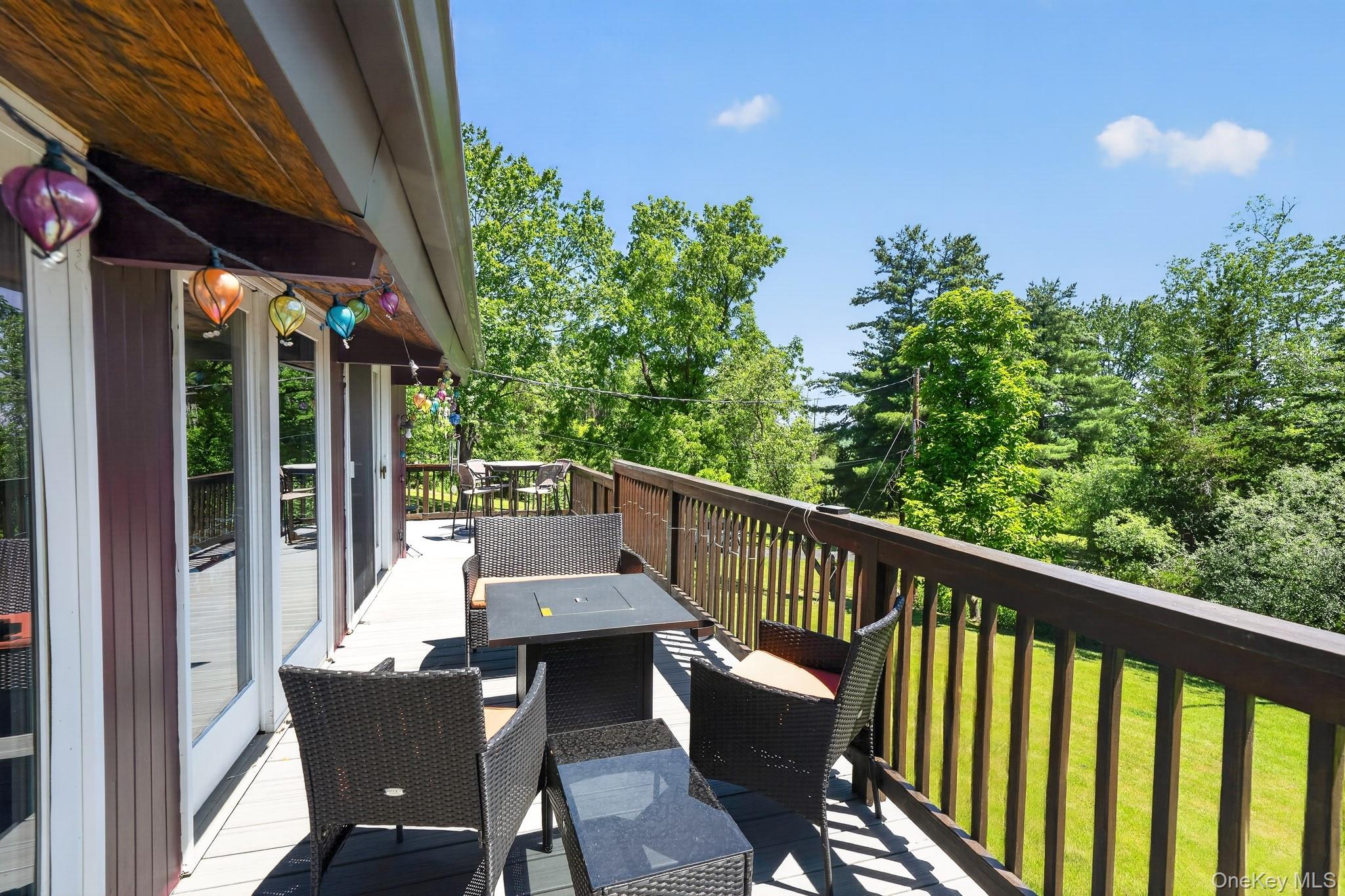 424 Laroe Road Chester, NY 10918 - Photo 16 of 43 Expansive outdoor deck with composite decking and a dark wood railing
