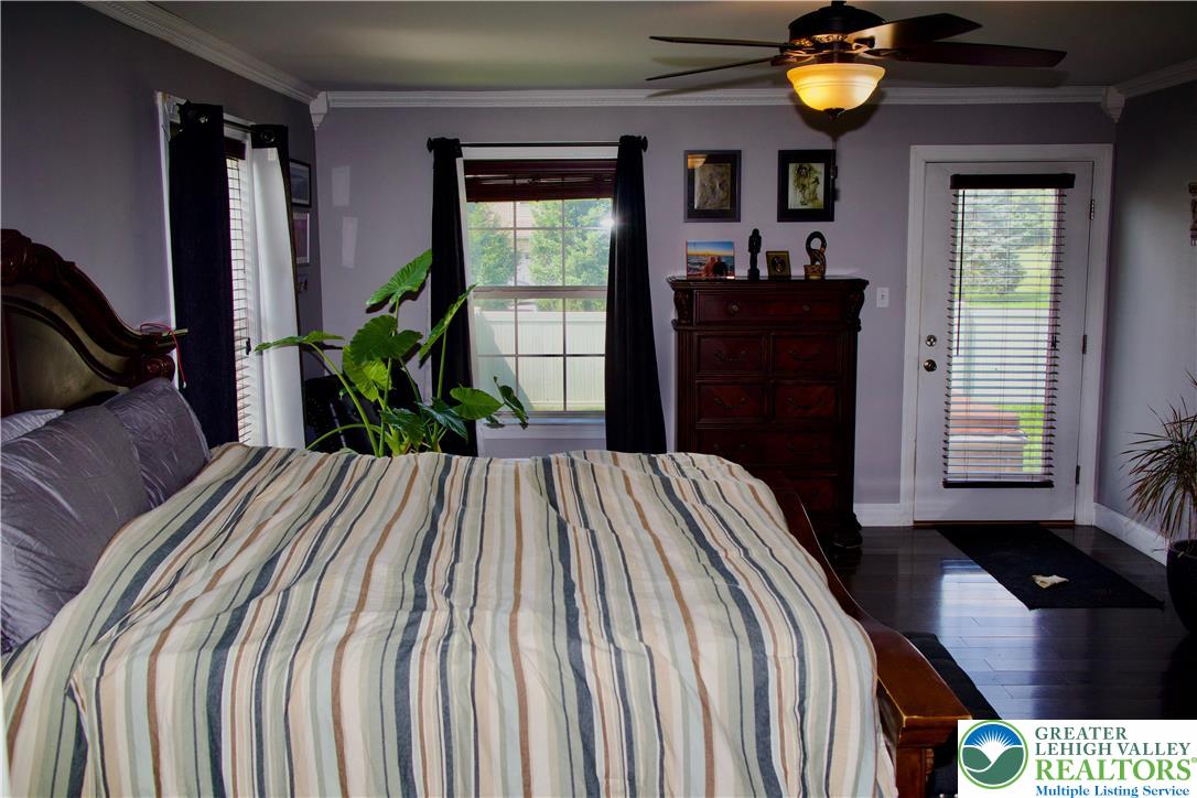 101 Cider Mill Road Mertztown, PA 19539 - Photo 6 of 26 a bedroom with a bed and window