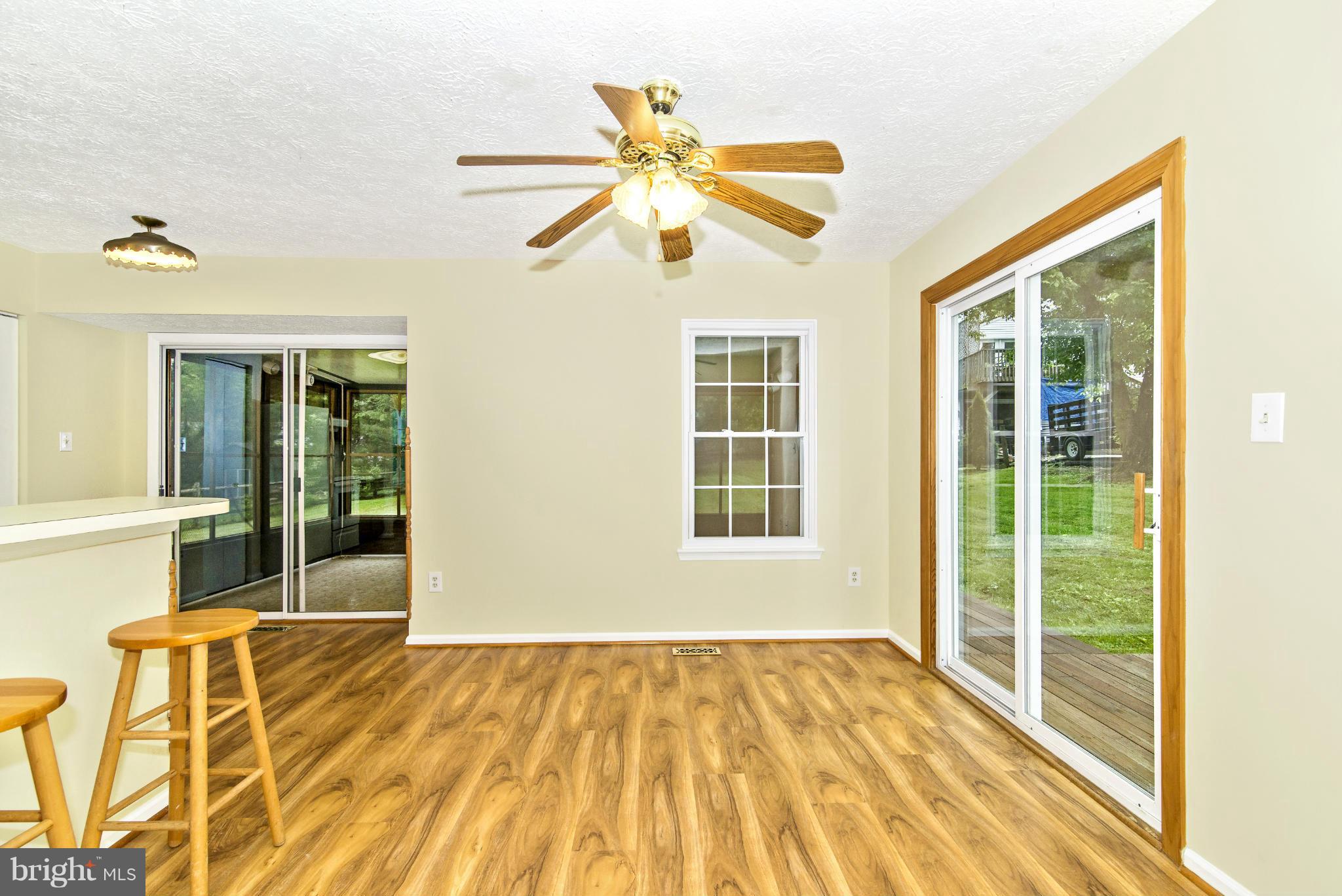 1709 Brookshire Run Point of Rocks, MD 21777 - Photo 15 of 24 a view of empty room with wooden floor and fan
