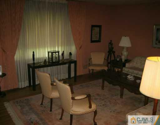 9 King Road Somerset, NJ 08873 - Photo 4 of 8 a dining room with furniture and wooden floor