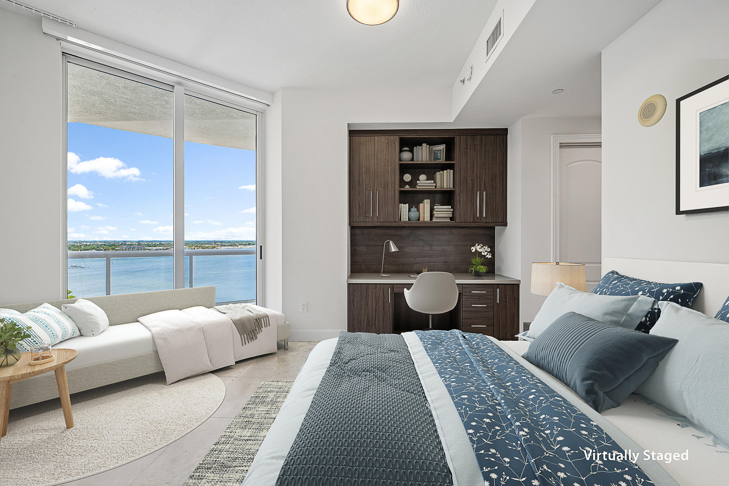 4600 North Ocean Drive, Unit 1903 Singer Island, FL 33404 - Photo 20 of 49 a bedroom with a bed and a couch