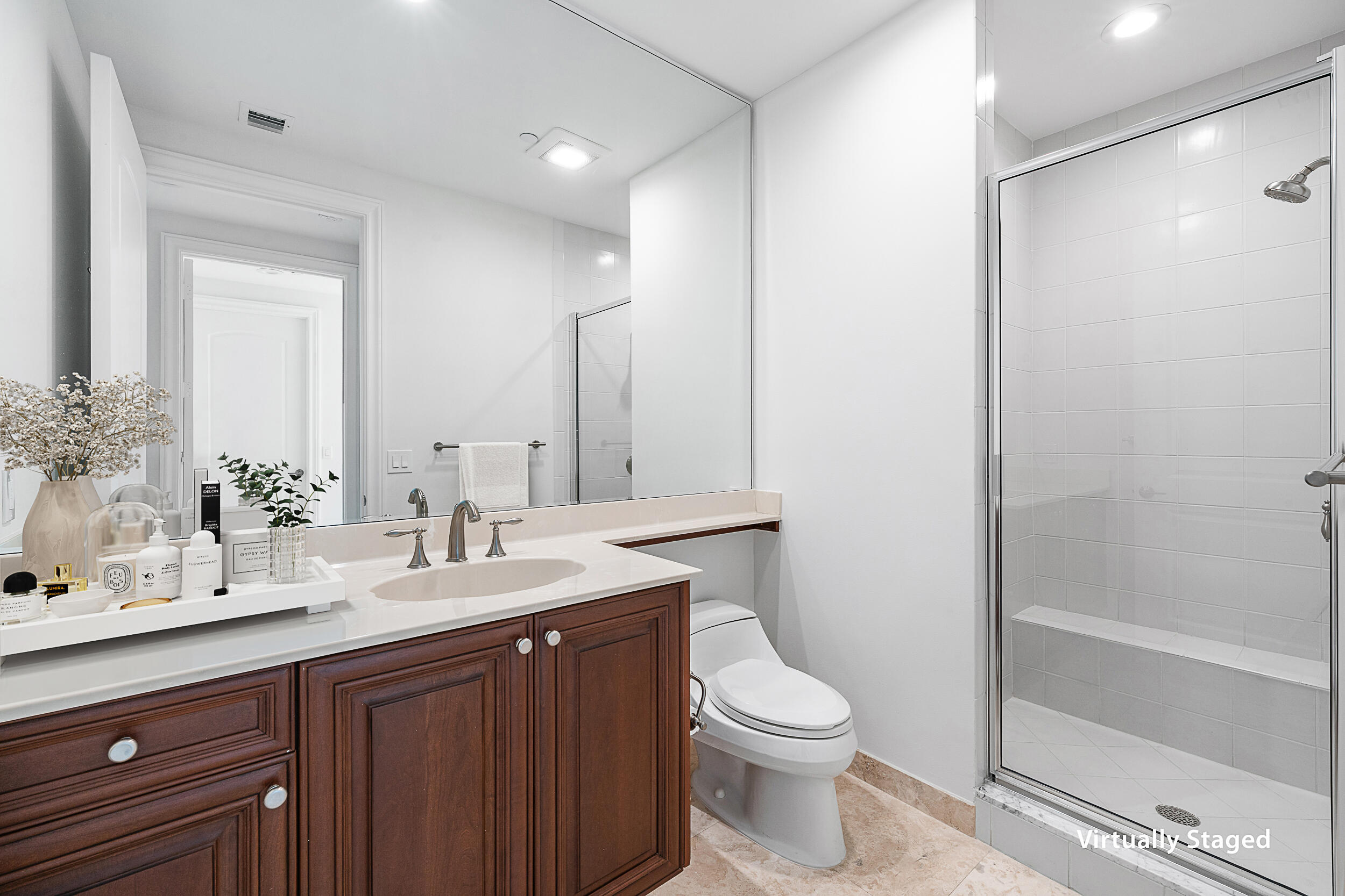 4600 North Ocean Drive, Unit 1903 Singer Island, FL 33404 - Photo 24 of 49 a bathroom with a double vanity sink toilet and shower