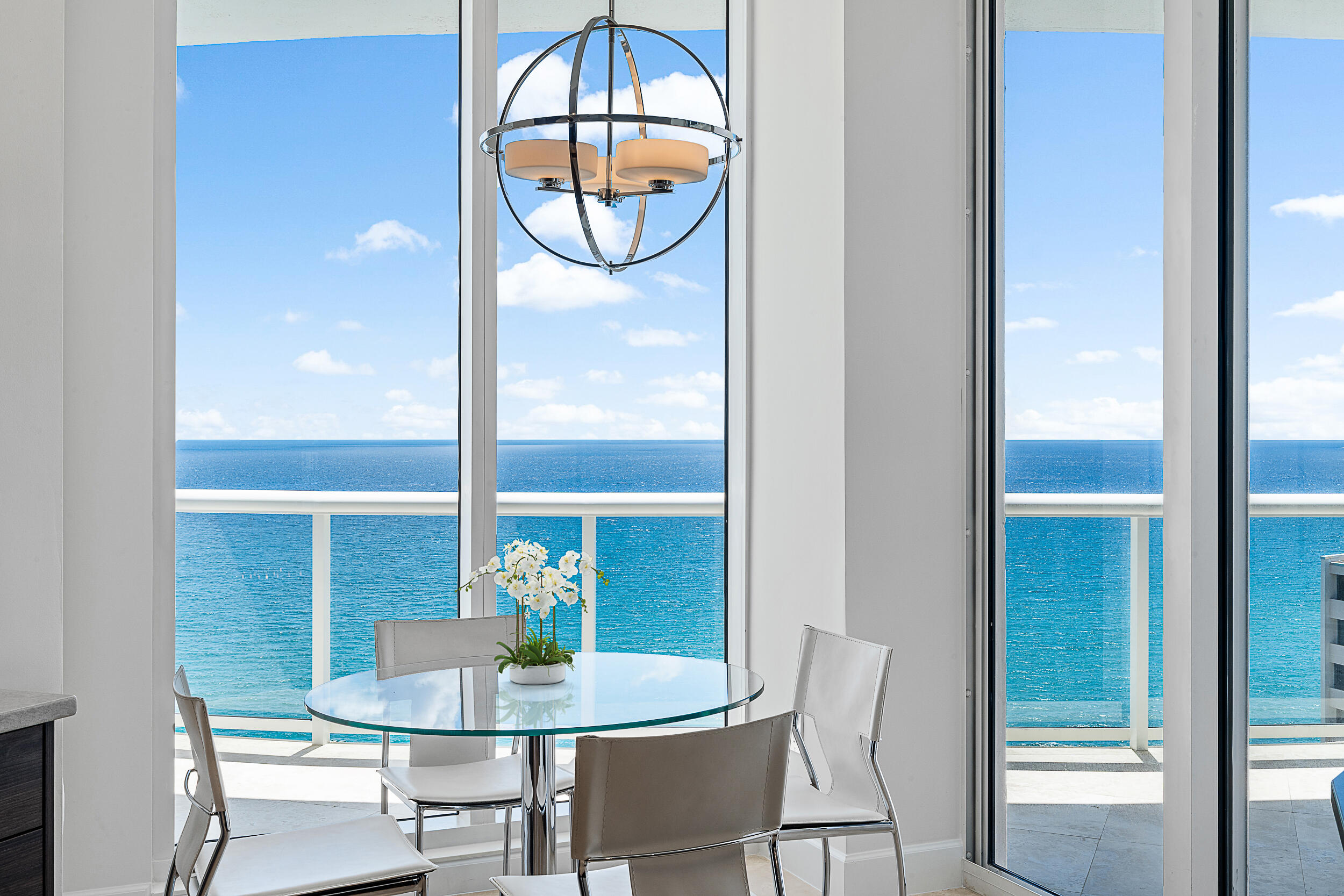 4600 North Ocean Drive, Unit 1903 Singer Island, FL 33404 - Photo 2 of 49 a view of a dining room with furniture window and outside view
