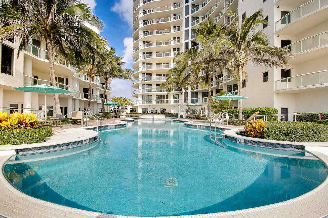 4600 North Ocean Drive, Unit 1903 Singer Island, FL 33404 - Photo 29 of 49 a view of a swimming pool with outdoor seating