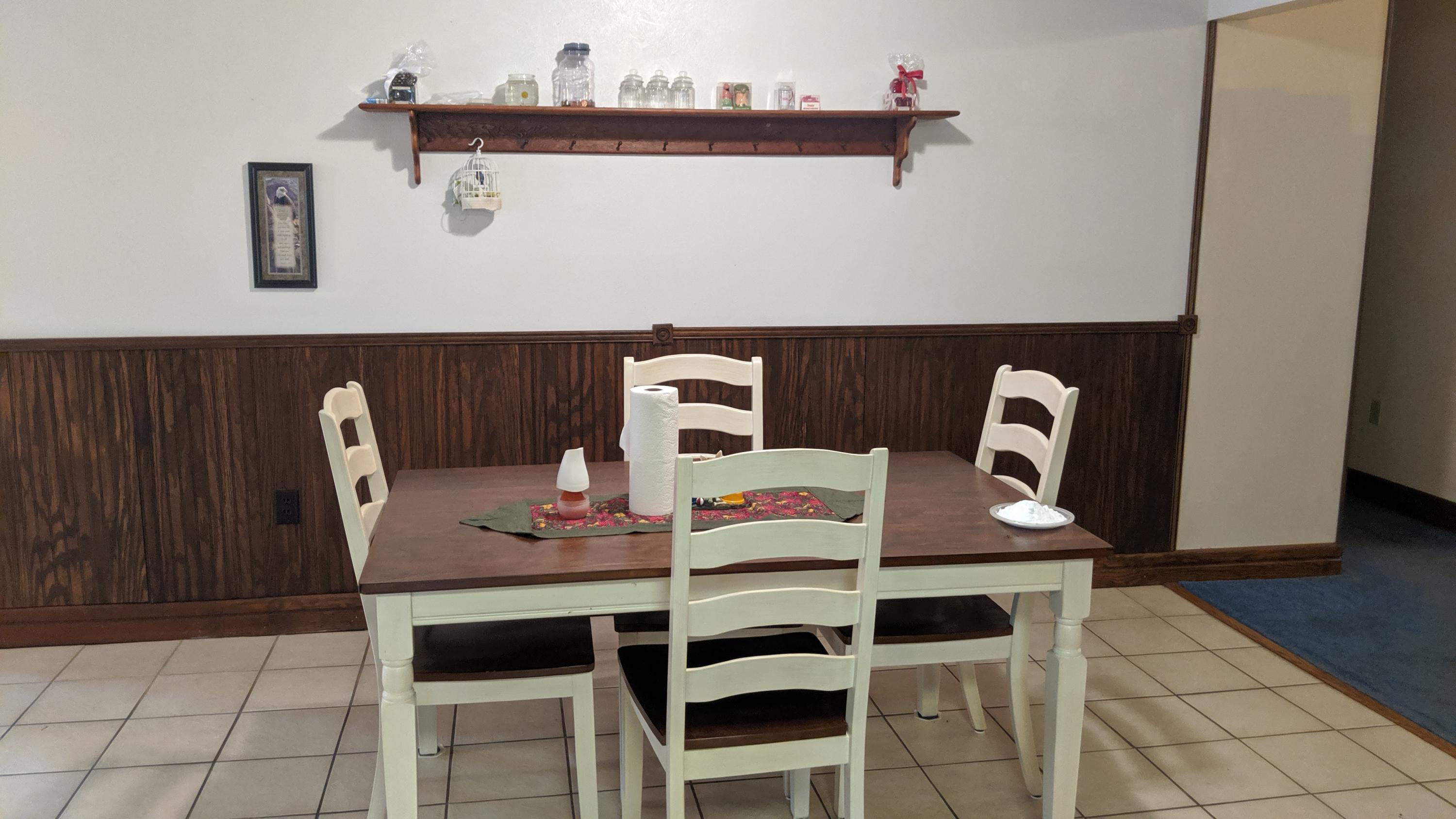 602 Valley Road Crestview, FL 32539 - Photo 14 of 34 a dining room with furniture and wooden floor