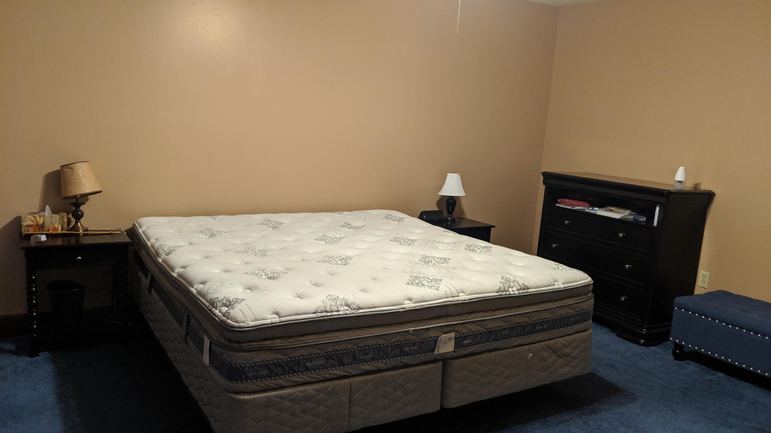 602 Valley Road Crestview, FL 32539 - Photo 19 of 34 a bed sitting in a bedroom and chair