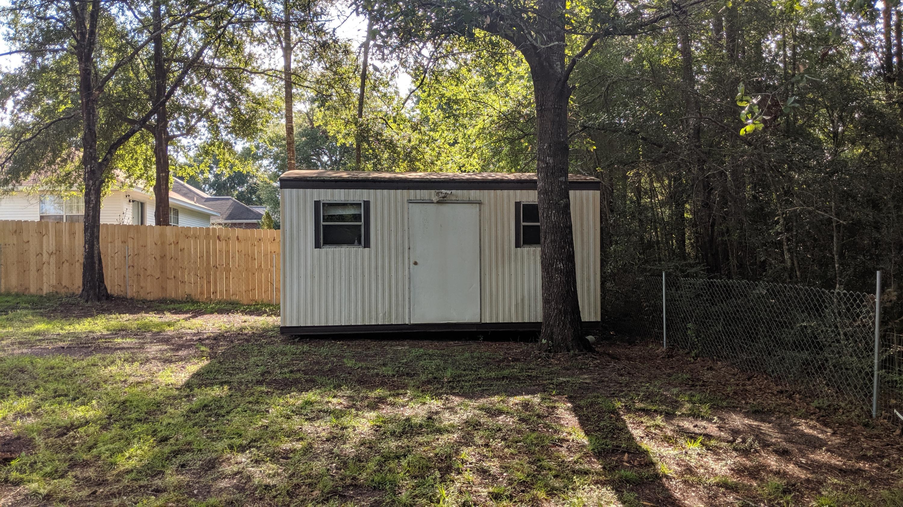 602 Valley Road Crestview, FL 32539 - Photo 31 of 34 a view of a backyard of the house