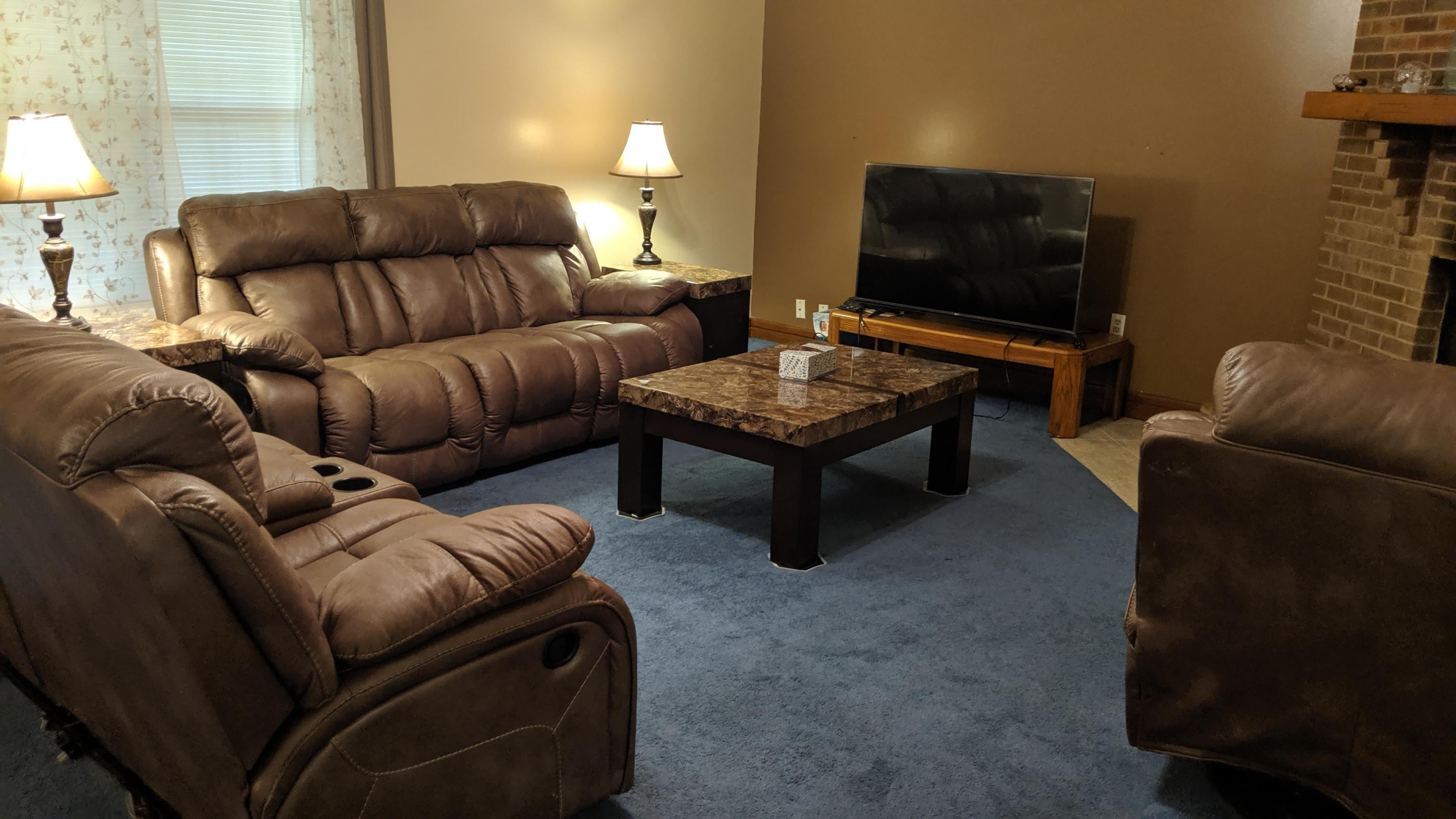 602 Valley Road Crestview, FL 32539 - Photo 7 of 34 a living room with furniture and a flat screen tv