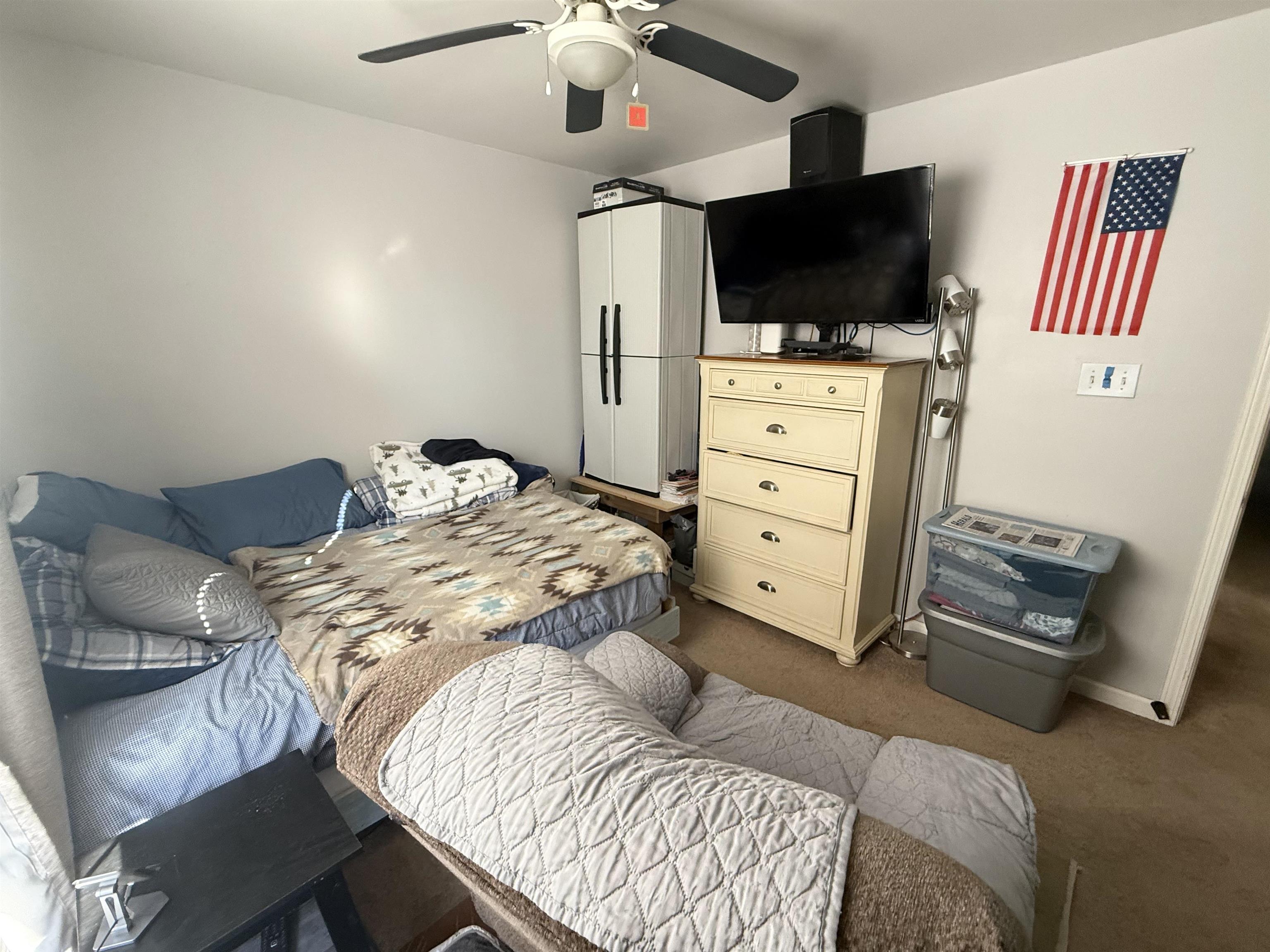 4 Rutledge Avenue Del Haven, NJ 08251 - Photo 11 of 21 a bedroom with a bed and flat screen tv