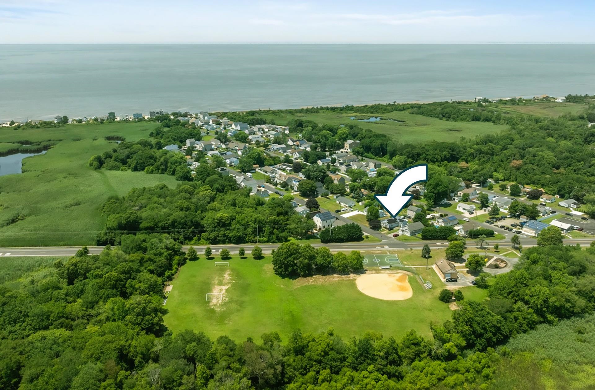 4 Rutledge Avenue Del Haven, NJ 08251 - Photo 3 of 21 a view of a lake with a city