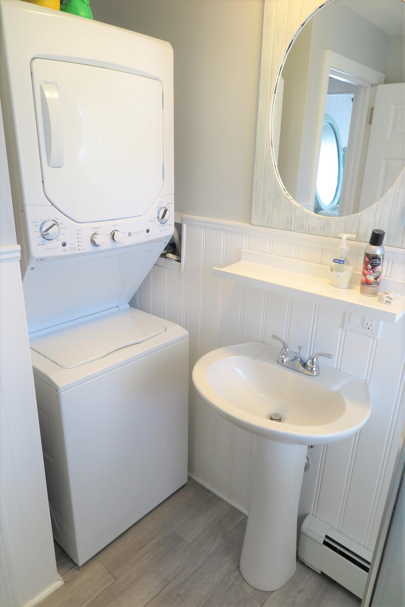 42 Bain Road Dennis Port, MA 02639 - Photo 17 of 46 a bathroom with a sink and a mirror