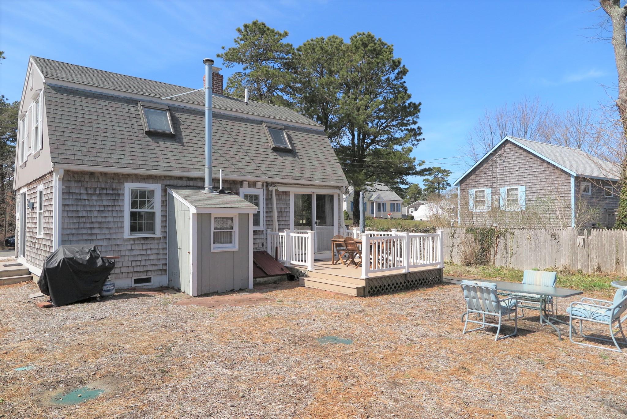 42 Bain Road Dennis Port, MA 02639 - Photo 2 of 46 a view of a house with sitting area and furniture